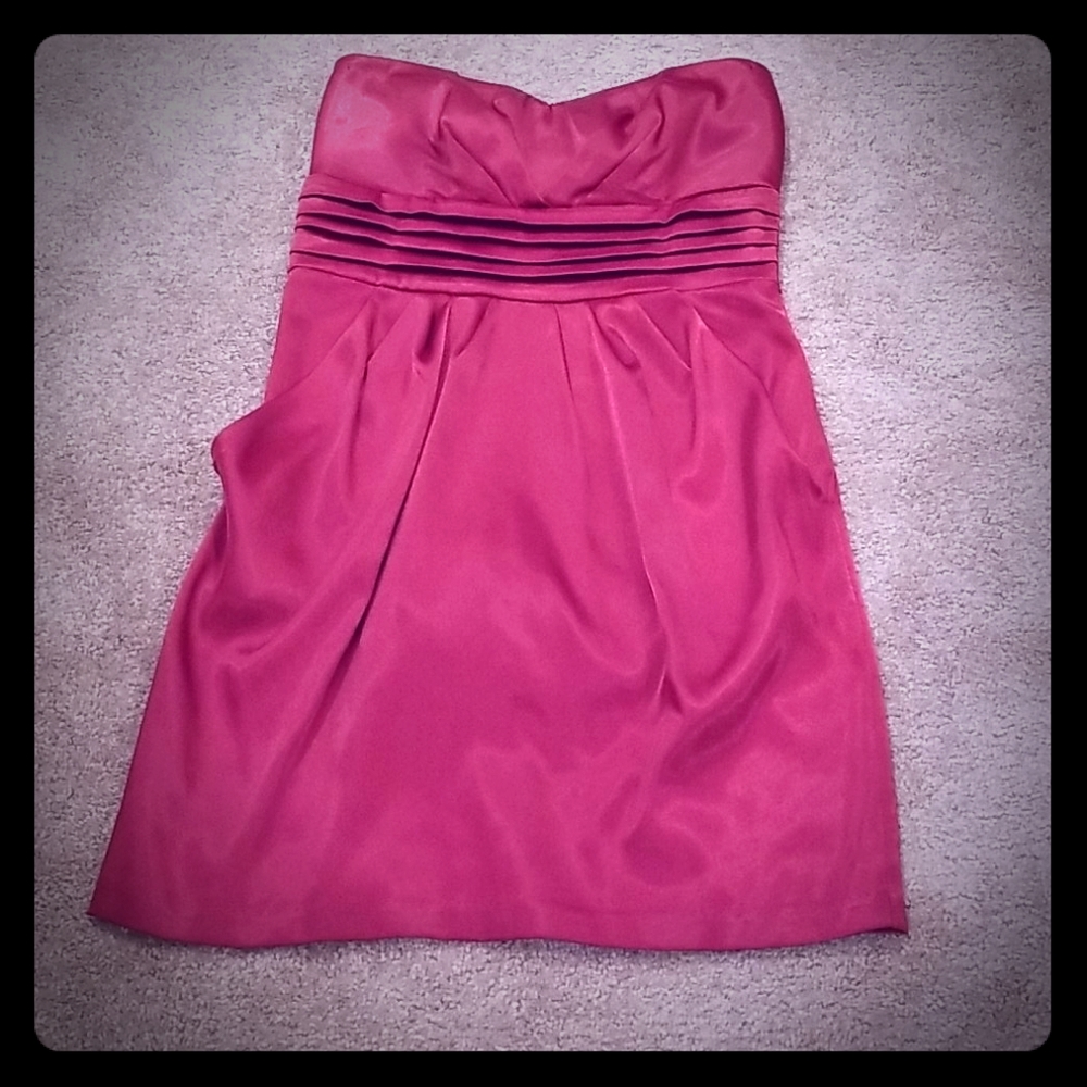 Red strapless cocktail dress.